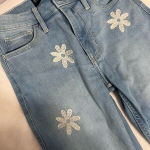 Hollister Blue boot cut Jeans with Daisy Embellishments
